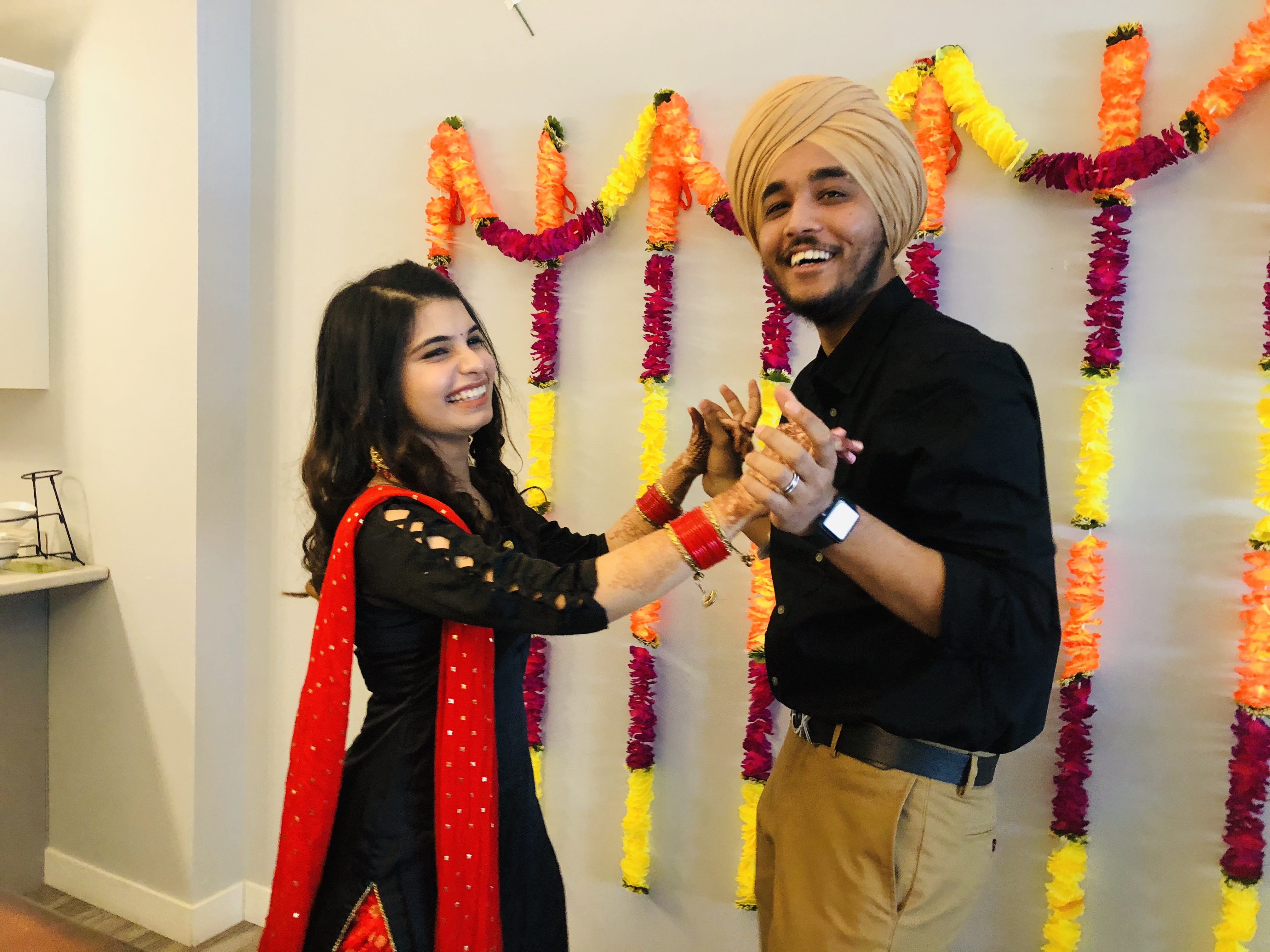 A photo of a male and female at their wedding.