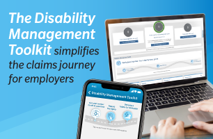 A person types on a laptop.